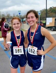 Race winner Rebecca Hearn (L) and Mary Shelton were Jacksonville's top two finishers in their sectional race.