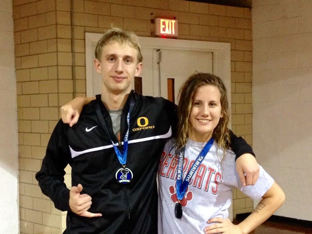 Oxford's Colton Smith (L) and Weaver's Lucia Balma were the high-point scorers in Thursday night's Calhoun County Swimming Championships.