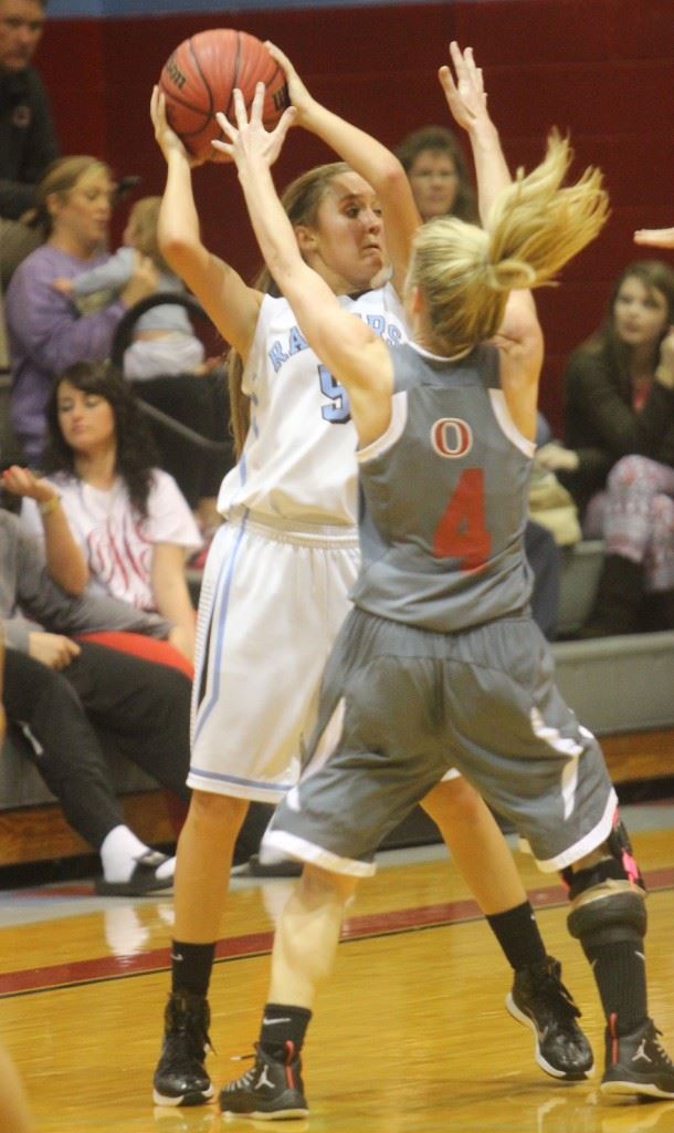 Ohatchee's Hannah Howell (4) plays some tight defense on Pleasant Valley's Atleigh Brannon. The Indians kept Brannon in check for three quarters, before she broke loose in the fourth. (Photo by Krista Walker)