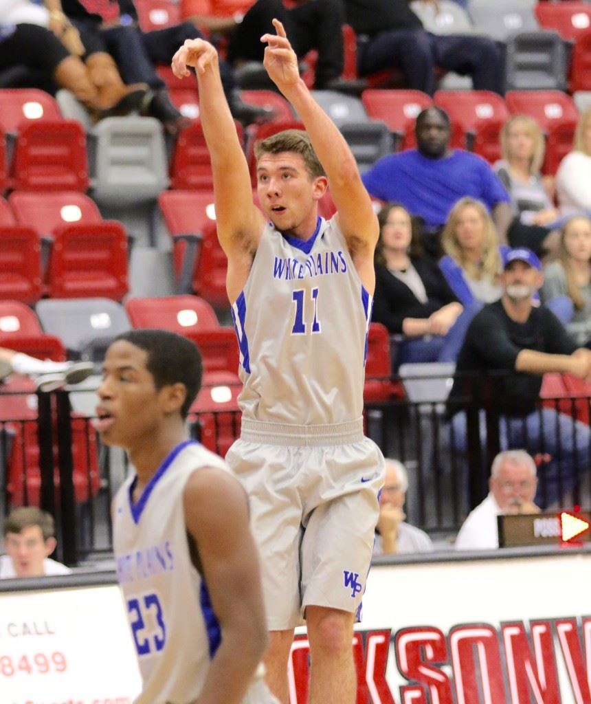 White Plains' Eli Hightower (11), shown from a game earlier this season, has hit five 3-pointers in his last two games and scored 51 points in the Wildcats' first three games of the Hilton Sandestin Beach Basketball Blowout. The Wildcats play in the consolation final today. (Photo by Kristen Stringer/Krisp Pics Photography)