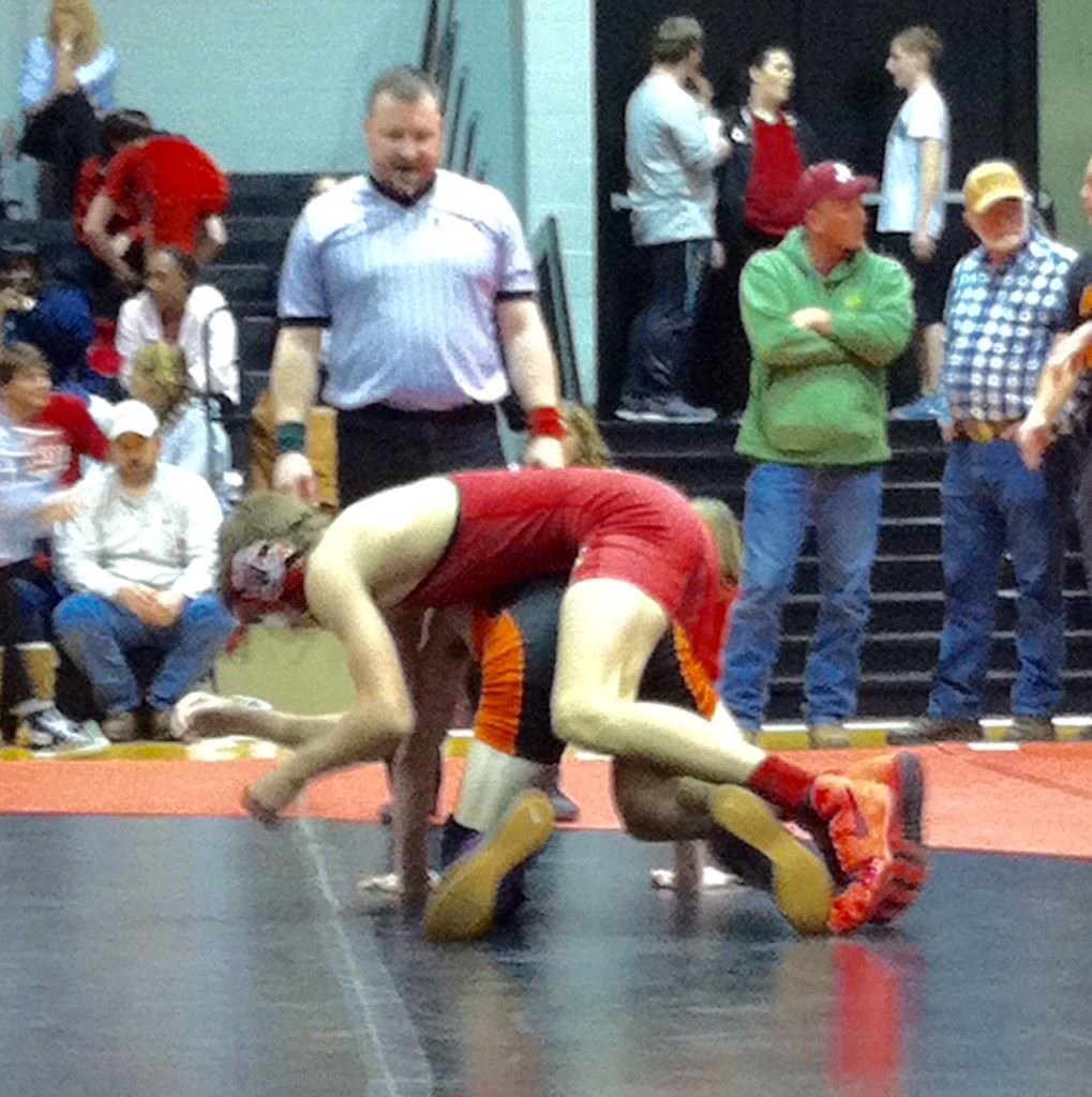 Weaver's once-beaten Nick Souder gets on top of Alexandria's Lane Trapp in their 115 championship match Tuesday. (Photo by Christy Souder)