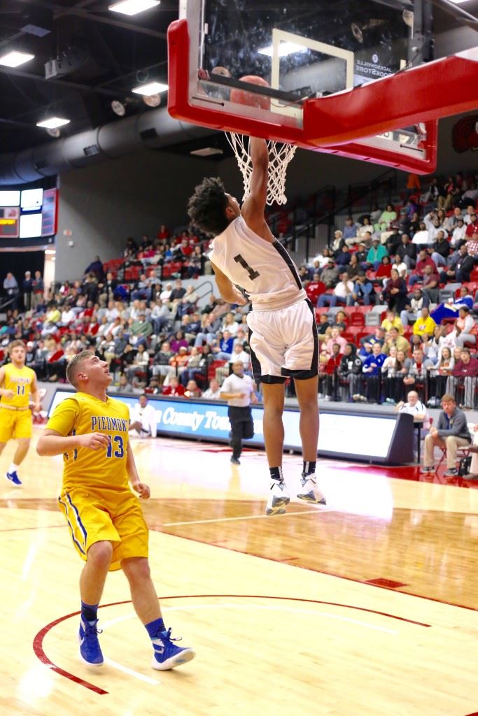 Diante Wood (1) deposits Sacred Heart's first points of the 2016 Calhoun County Tournament Wednesday. (Photo by Kristen Stringer/Krisp Pics Photography)