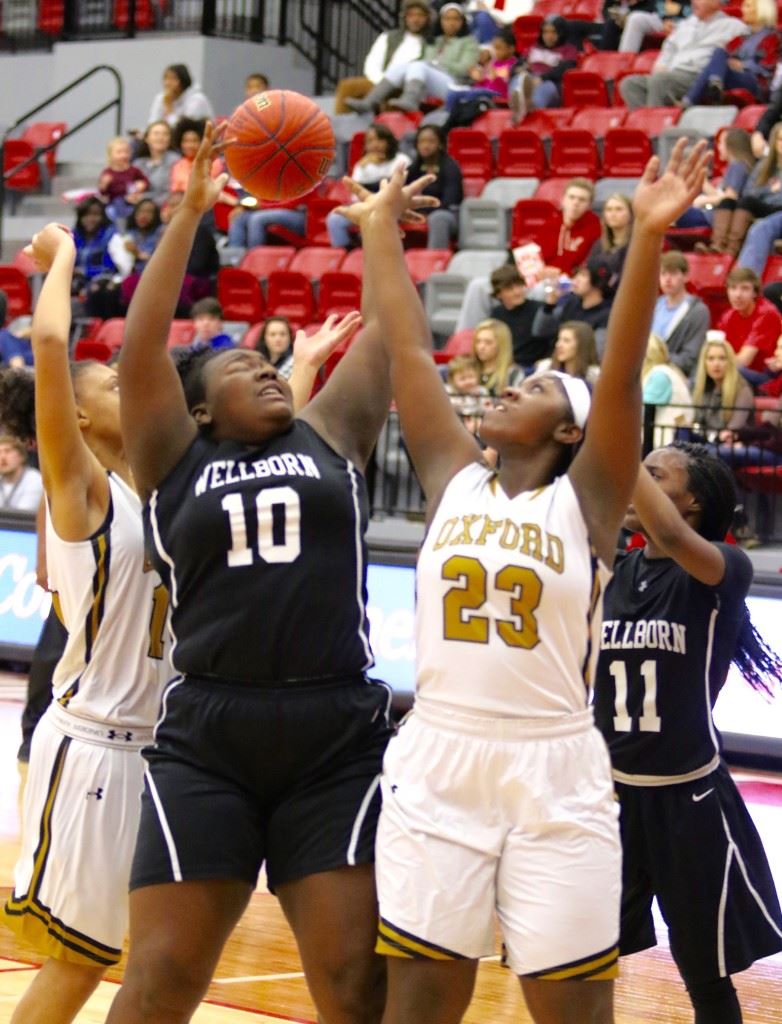 Oxford's Ebony Kelley (23) battles with Wellborn's Madison Files for a rebound during the Calhoun County Tournament. (Photos by Kristen Stringer/Krisp Pics Photography)