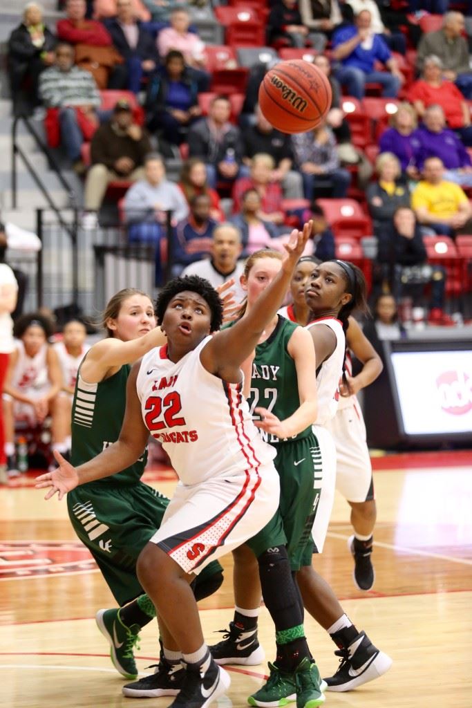 Saks junior Tee Tee Jenkins uses the basketball court to get away from outside pressures. She let herself be free Wednesday and came off the bench to have a career game. (Photos by Kristen Stringer/Krisp Pics Photography) 