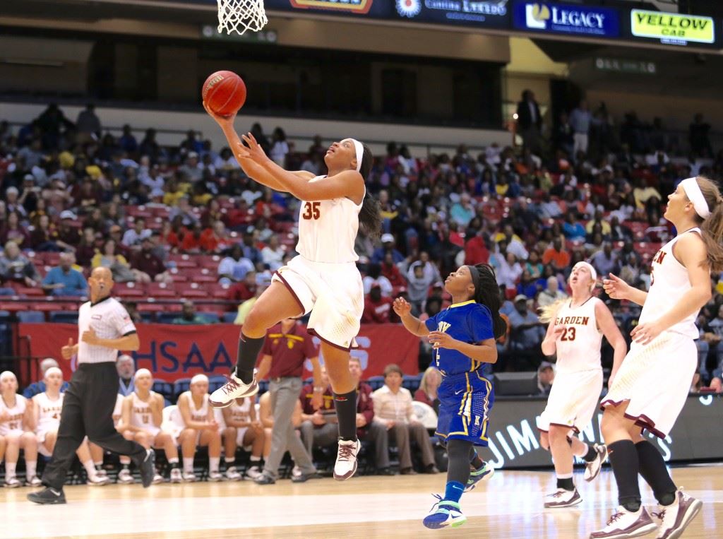 Tykeah Rogers (35) gets behind everybody for a fast-break layup in Monday's Class 1A girls state semifinal game. (Photos by Kristen Stringer/Krisp Pics Photography)