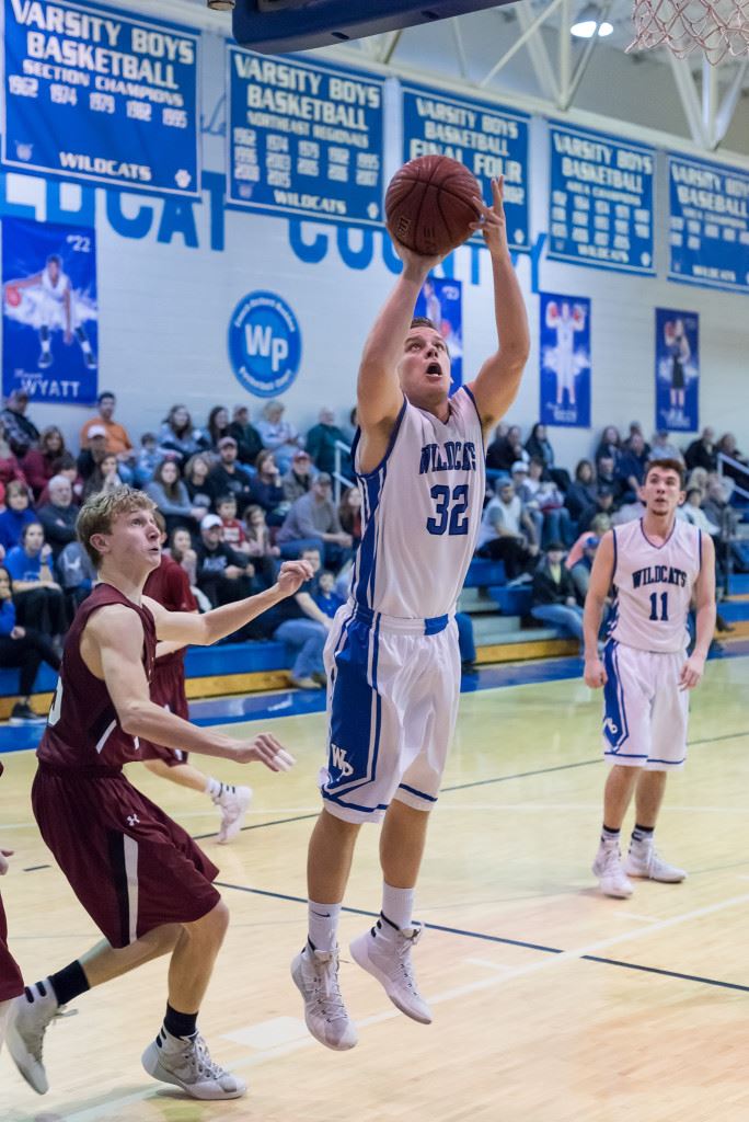 Murphy Doss (32) played a big part in White Plains' 28-point third quarter Tuesday night. On the cover, Jerod Guthrie (3) and Eli Hightower (11) trap Sardis' Drew Scott. (Photos by Stephen Miller)