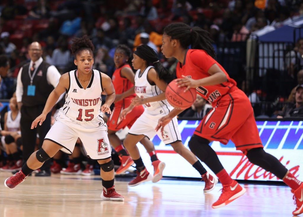 Anniston's Davia Palmer (15) moves in to defend against Central Tuscaloosa leading scorer Traniya Pitts. (Photo by Kristen Stringer/Krisp Pics Photography)