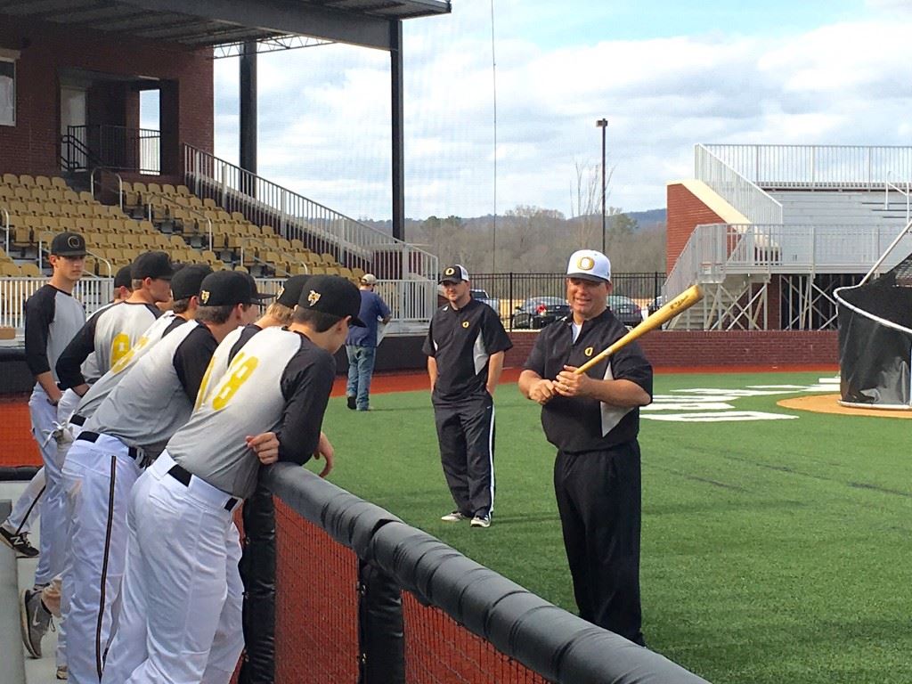 Oxford baseball coach Wes Brooks has a little fun with his players before sending them into infield/outfield drills for the first time at Choccolocco Park.