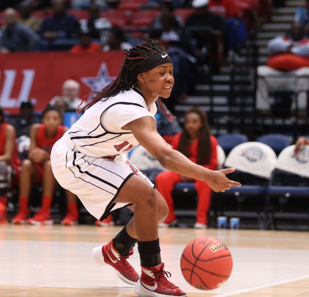 Anniston guard Raven Cooley was a third-team all-state pick in Class 5A. On the cover, Spring Garden all-state picks (from right) Madison Sides and Tykeah Rogers cut off a path to the basket in the Class 1A title game. (Photos by Kristen Stringer/Krisp Pics Photography)