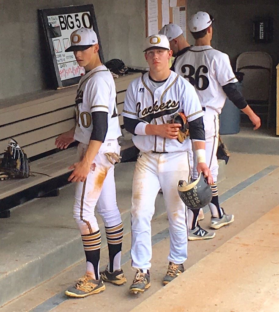 Nate Lloyd (C) heads to the clubhouse after Oxford put the finishing touches on its 8-5 win over Jacksonville. On the cover, Lloyd swings from the left side, where he hit the first home run at the Choccolocco Park signature baseball field. (Cover photo by B.J. Franklin/GungHo Photos) 