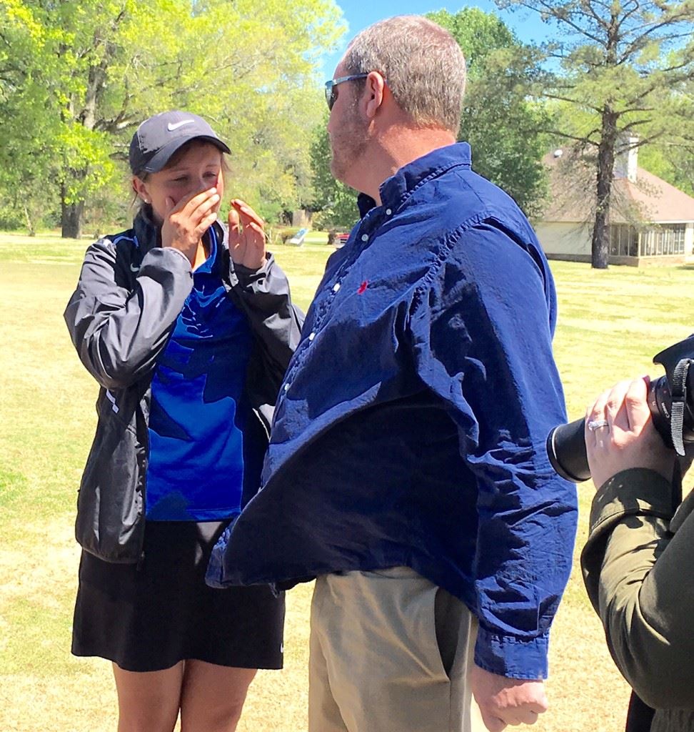 County champion Layne Dyar gets a little emotional after making 9 on the final hole. She still won by four shots. (Staff photo)
