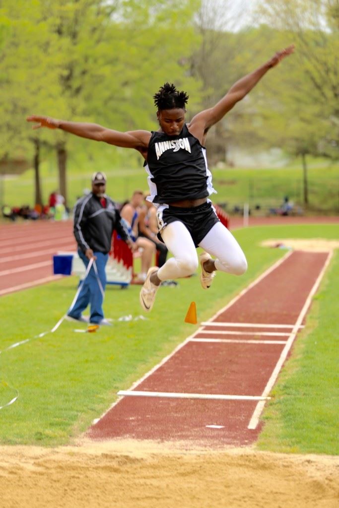 Anniston's Tae Miller won the long jump and the triple jump, setting the county long jump record on his first attempt of the day. (Photo by Kristen Stringer/Krisp Pics Photography)