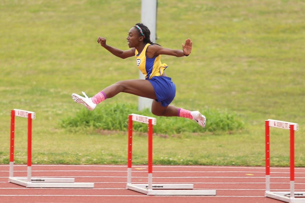 Piedmont's Karri Green won four events, including a record-shattering performance in the 100 hurdles. (Photo by Kristen Stringer/Krisp Pics Photography)