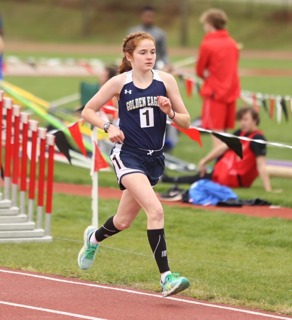 Jacksonville's Rebecca Hearn won the girls 1600 and 3200, setting the record in the 1600. (Photo by Kristen Stringer/Krisp Pics Photography)