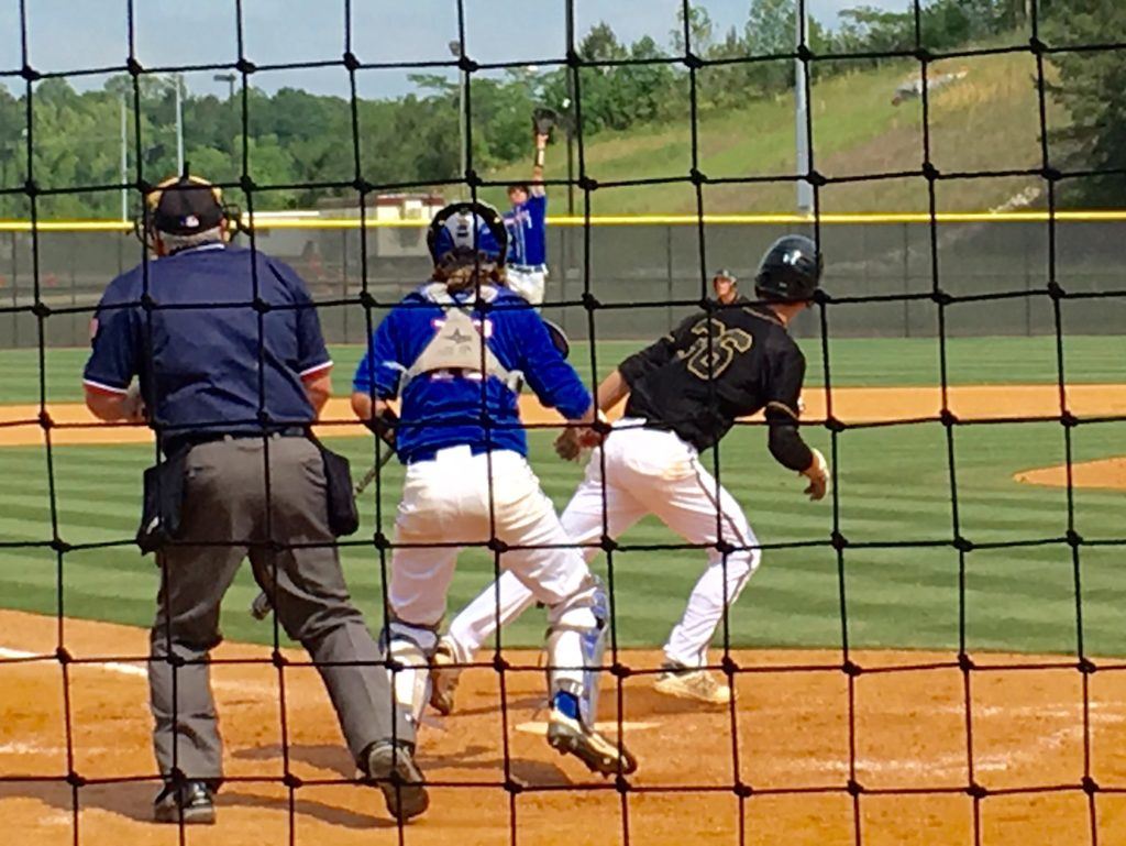 Oxford's Andy Hammond (36) follows the flight of his series-winning single in the bottom of the seventh inning Saturday. 