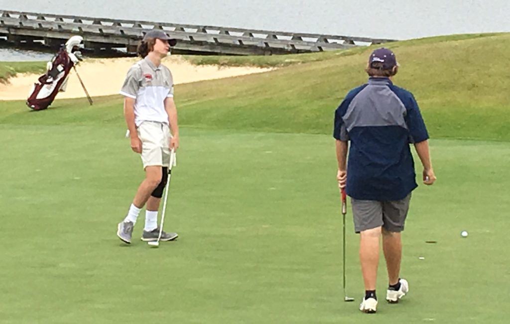 Donoho's Jack Svensen reacts to his putt during Monday's opening round of the AHSAA state tournament.