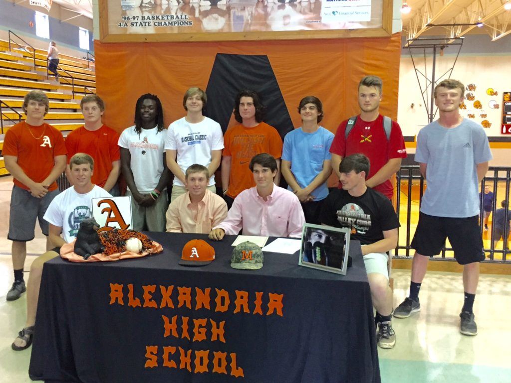 Alexandria's Will Reaves (front row, second from right) is joined by his Valley Cubs teammates at his signing ceremony with Marion Military Institute Wednesday.