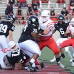 Linemen Jamesio Elston of Wellborn (76) and Garrett Young of Ohatchee (69) wage war up front.