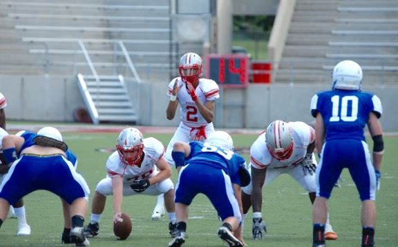 Saks sophomore quarterback LaDerrick Bell awaits the snap.