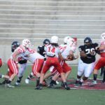 Ohatchee quarterback Taylor Eubanks (14) hands to Austin Tucker.