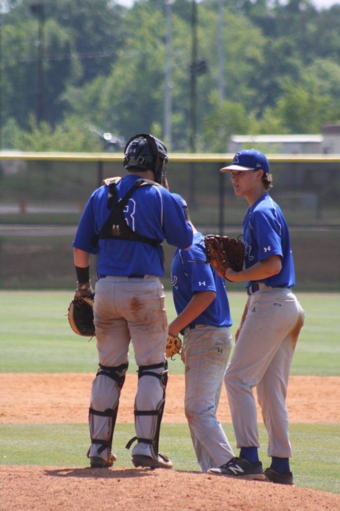 Excel Blue Sox' Landon Green (R) goes through the signs with catcher Dalton King. (Photo by Connie Green) 