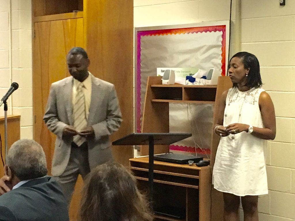 New Anniston basketball coach Torry Brown and his wife Deidra are introduced at the Anniston school board meeting Thursday night.