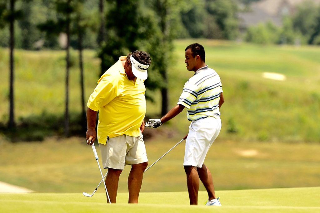 Chad Calvert (L) and Billy Thompson finished first and third, respectively, in the first flight. Calvert shot 69 Sunday with a borrowed putter.(Photo by Sandra Howell) 