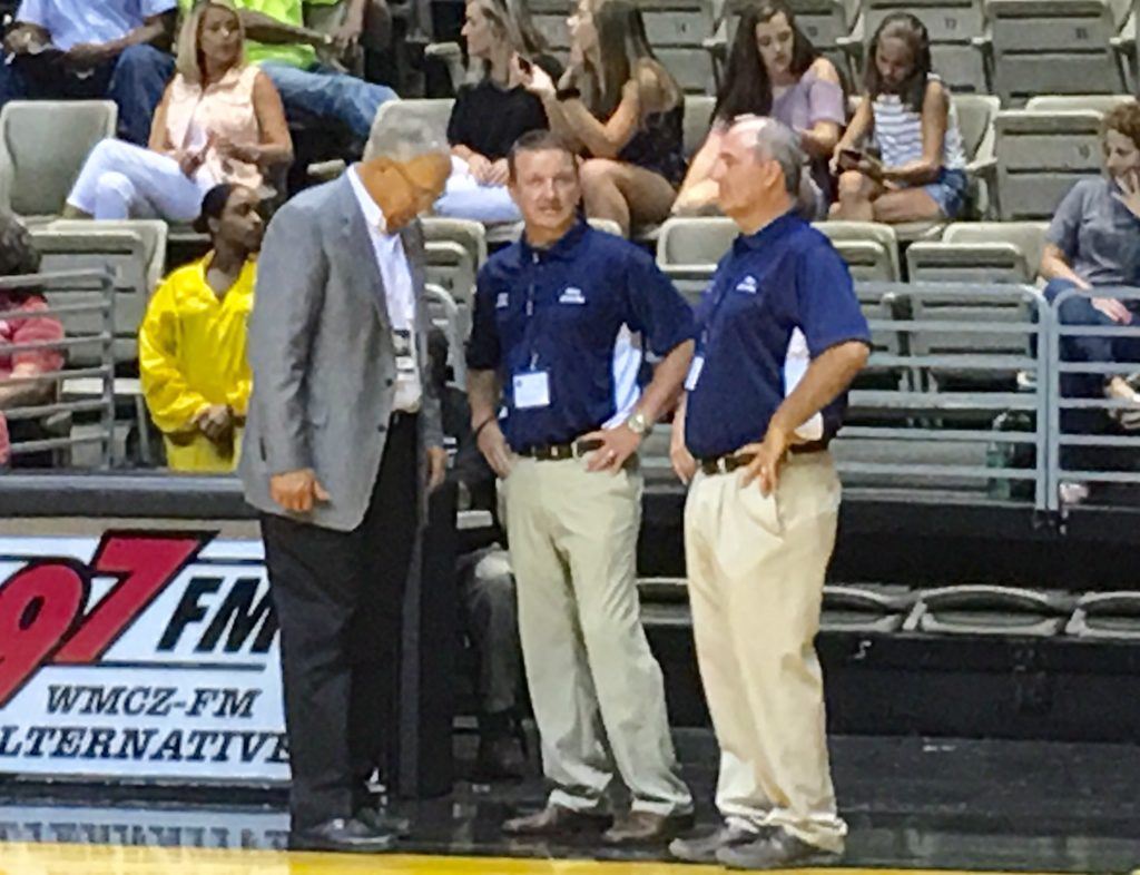 North coaches Chris Randall of White Plains (C) and Geraldine's Cale Black share a moment with AHSAA executive director Steve Savarese moments before the North-South boys basketball all-star game. On the cover, Faith Christian's Jordan Griswould (1) and Oxford's Jakolbe McClendon run through a drill in pre-game warmups.