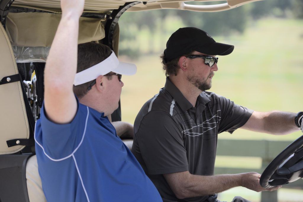 Ty Johnson (L) and Keith Howell shot 66 in the best-ball round at Anniston Country Club and are two shots off the lead in their flight. (Photo by Sandra Howell)