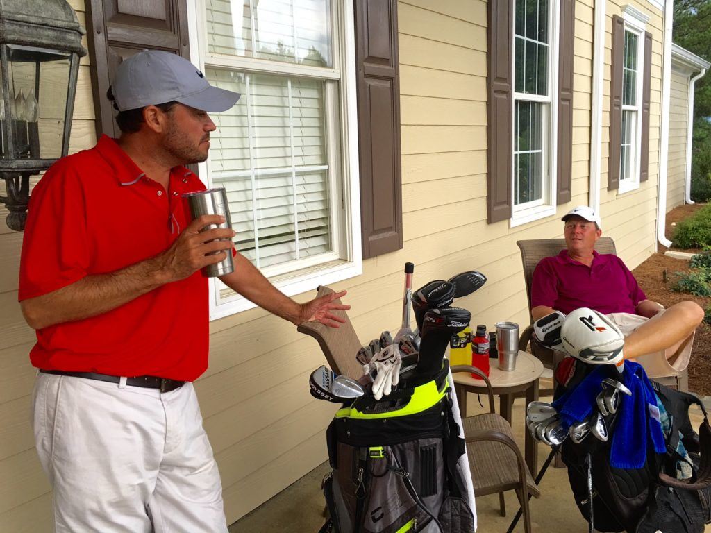 Kevin Daugherty (L) and Randy Reaves talk about the day after Reaves jumped in to serve as a relief partner when Brian Woodfin fell ill right before their scheduled tee time.