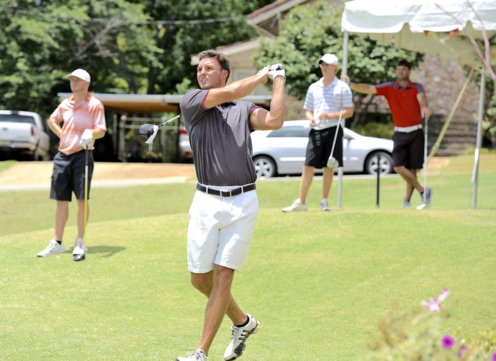 Tanner Wells drives off the 17th tee at Anniston CC Sunday. Wells and partner Drennan Beam finished eighth in the first flight. (Photo by Sandra Howell)