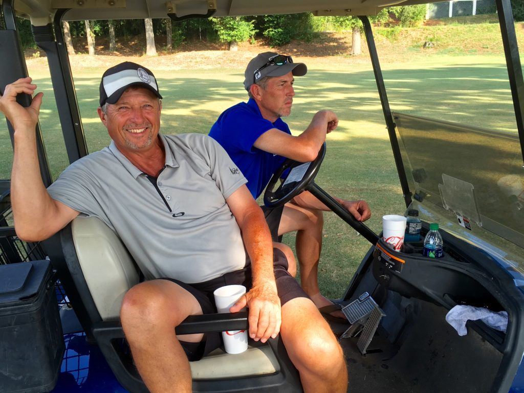 T.J. McGatha (L) and Jeff Barnwell take in the action at Anniston CC after playing at Silver Lakes and finishing tied for fourth in the fifth Toyota Tundra flight.