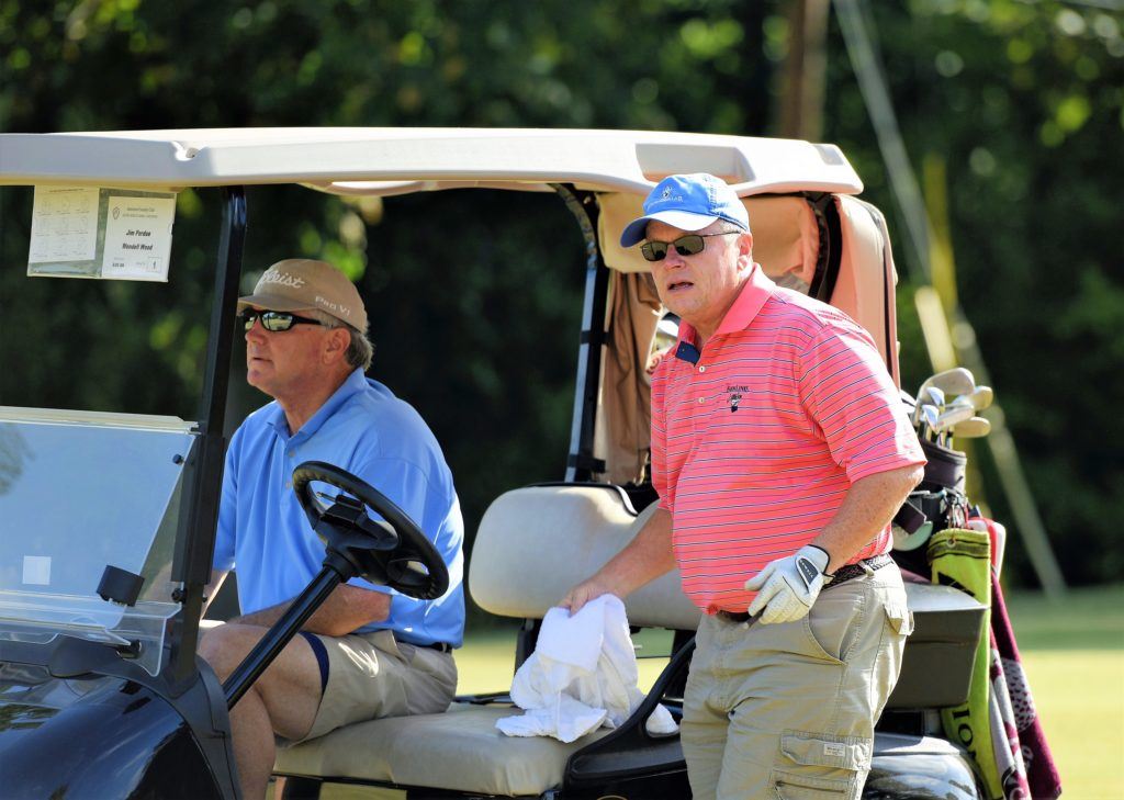 Jim Perdue (standing) and Wendell Wood shot 69 at Anniston CC Saturday. (Photo by Sandra Howell)