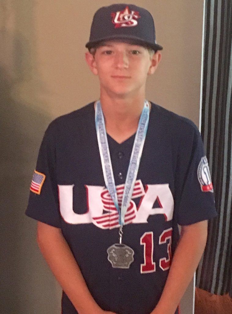 Oxford's Dawson Campbell wears his Team USA jersey and the silver medal he helped it win in the 12U Pan American Championships in Mexico. (Photos courtesy of Keith Campbell)