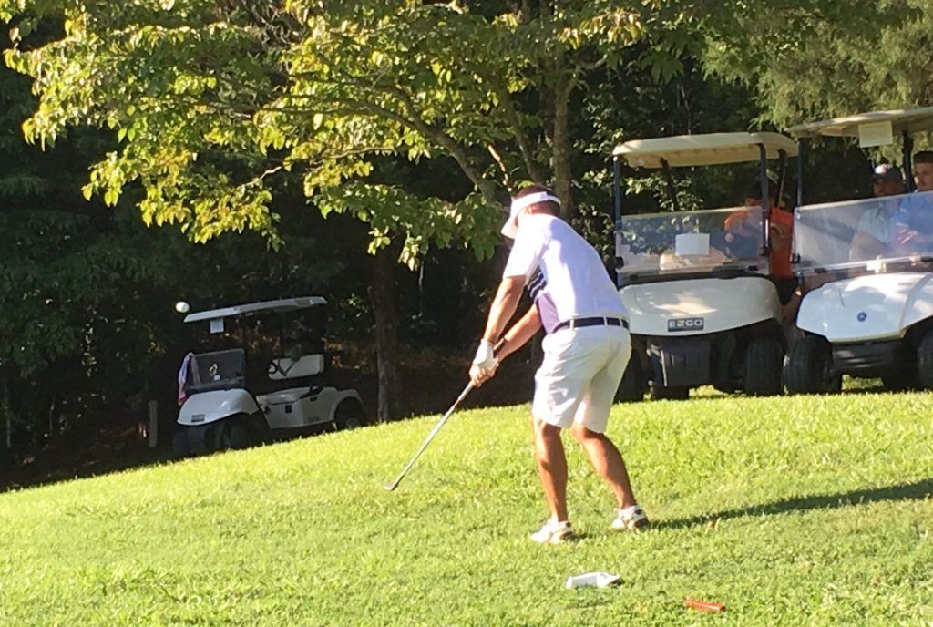 Jeremy McGatha chips back to the second playoff green Sunday. His best shot of the day left him with an awkward stance and lie that resulted in a poor stroke and gave Ott Chandler the opening to win the Calhoun County Championship.