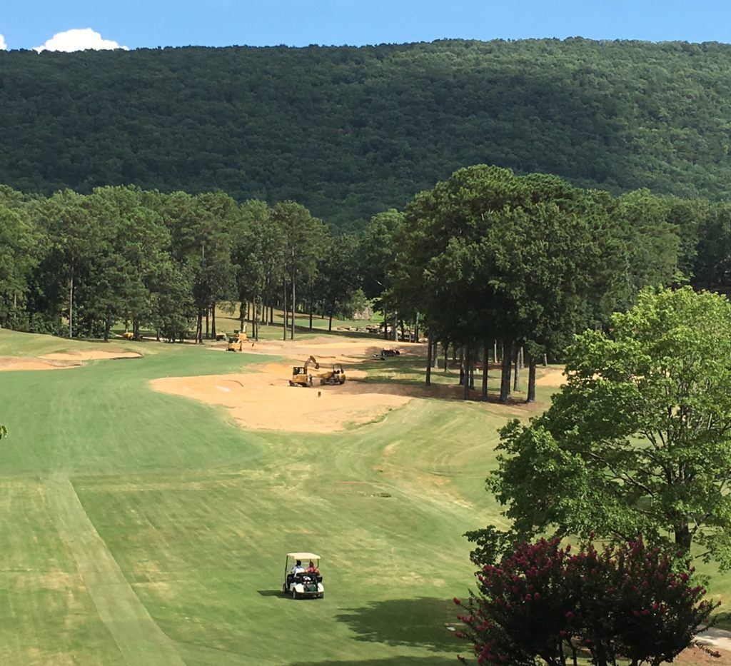 The view from the tee captures crews working on the 14th hole at Shoal Creek. On the cover, Jack Nicklaus briefs the club membership on the renovations currently underway at the classic course.