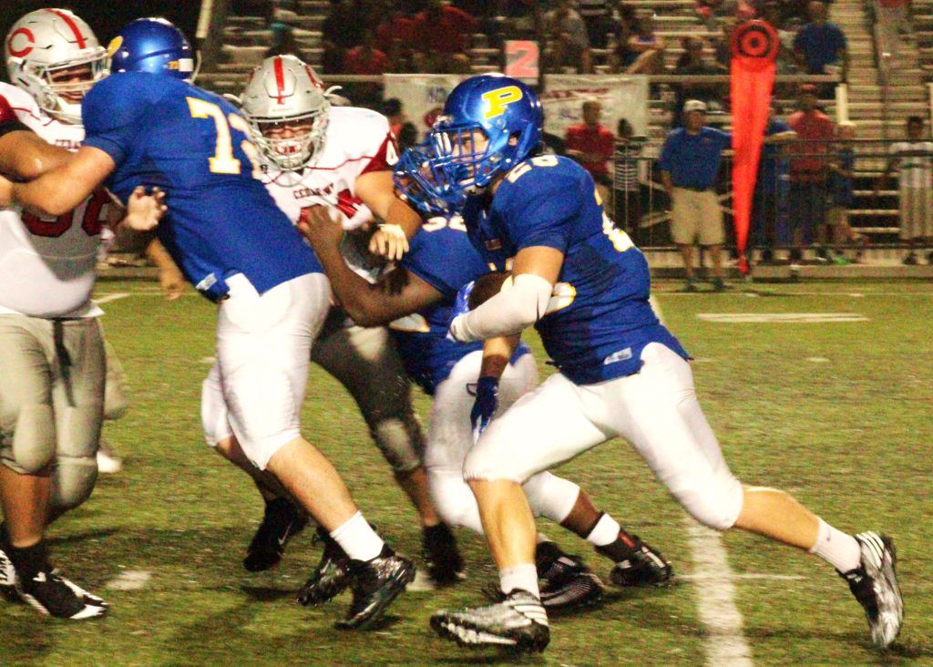 Austin Brazier (above) and Taylor Hayes (cover) are full-steam-ahead in Piedmont's game with Cedartown Friday night. (Photos by Shannon Fagan)