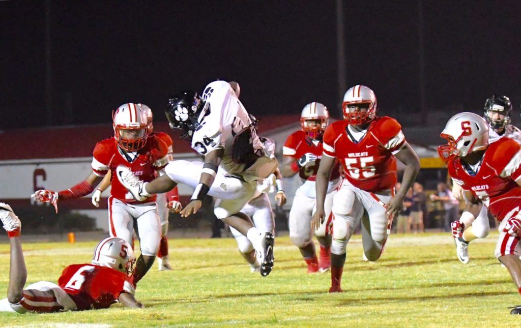 The Saks defense converge on Kedrick Harris (34) to ensure the Wellborn ballcarrier doesn't go anywhere when he regains his feet. 