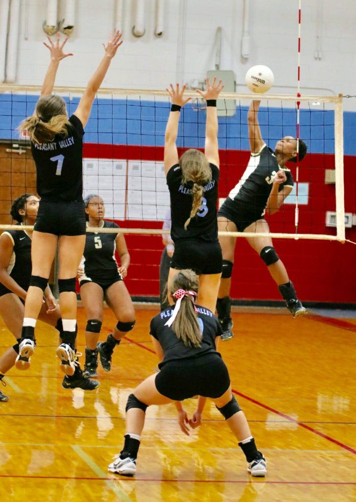 Oxford's Alex Gomez (3) goes way up to spike against Pleasant Valley. (All photos by Daniel Lee, Tanner Richards/Tank Photography)