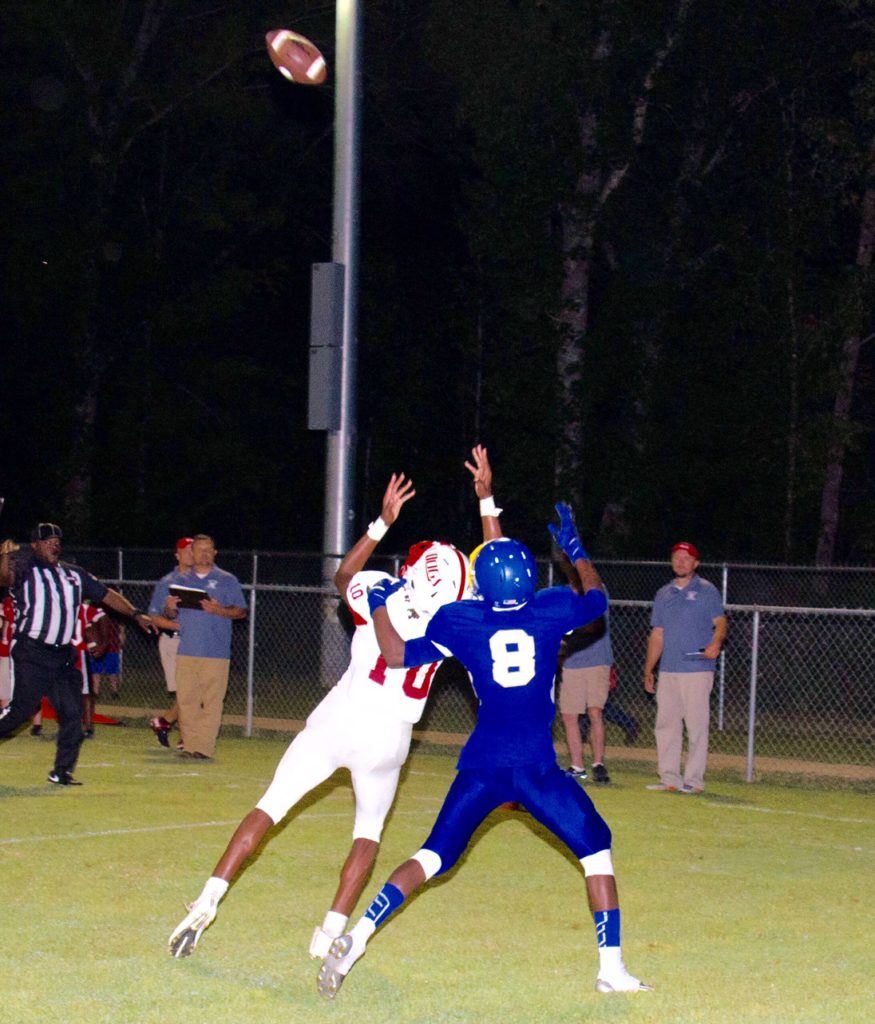 Wadley's Quae Drake (10) waits on a pass with TCC defender Damion Swain (8) draped over him; pass interference was called on the play. On the cover, Drake tries to haul in a two-point conversion pass against the tight defense of Nidell Burrell. (Photos by Christy Fordham).