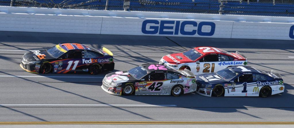 Jamie McMurray (1) gets right up on the bumper of Kyle Larson. Denny Hamlin (11) and Ryan Blaney are close hoping they keep it together.