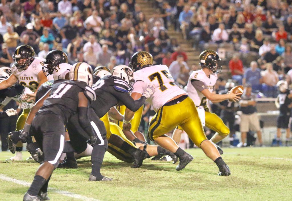 Clay Webb (75) anchors an offensive line that helped Oxford gain nearly 400 yards of total offense Friday night. (Photo by Kristen Stringer/Krisp Pics Photography)
