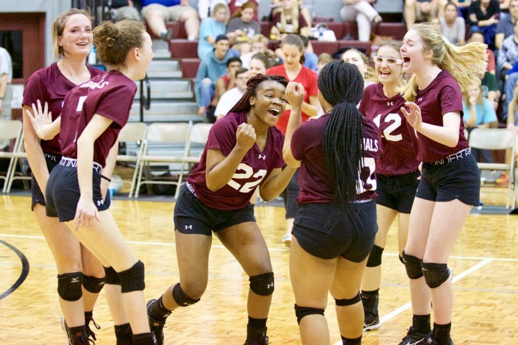 Jumoke Sanusi (22) leads the celebration after Sacred Heart outlasted Faith Christian to earn a spot in the Class 1A regionals. 