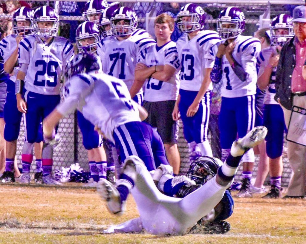 Ranburne's Jordan English is tripped up by the Randolph County defense. The Bulldogs struggled to get anything going against the Tigers. On the cover, Jai Wright scores Randolph County's second touchdown of the game. (Photos by Jeremy Wortham/Tiger Den Photography)