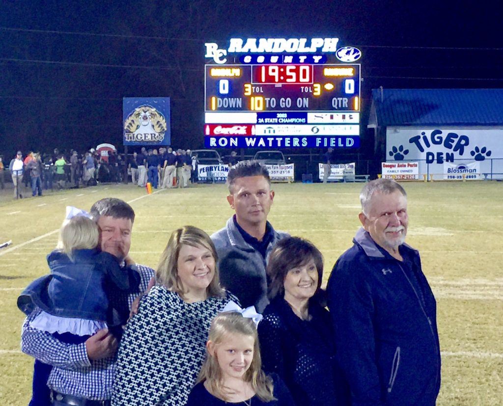 Former Randolph County coach Ron Watters and his family were recognized Friday with the coach having the football field named in his honor. 