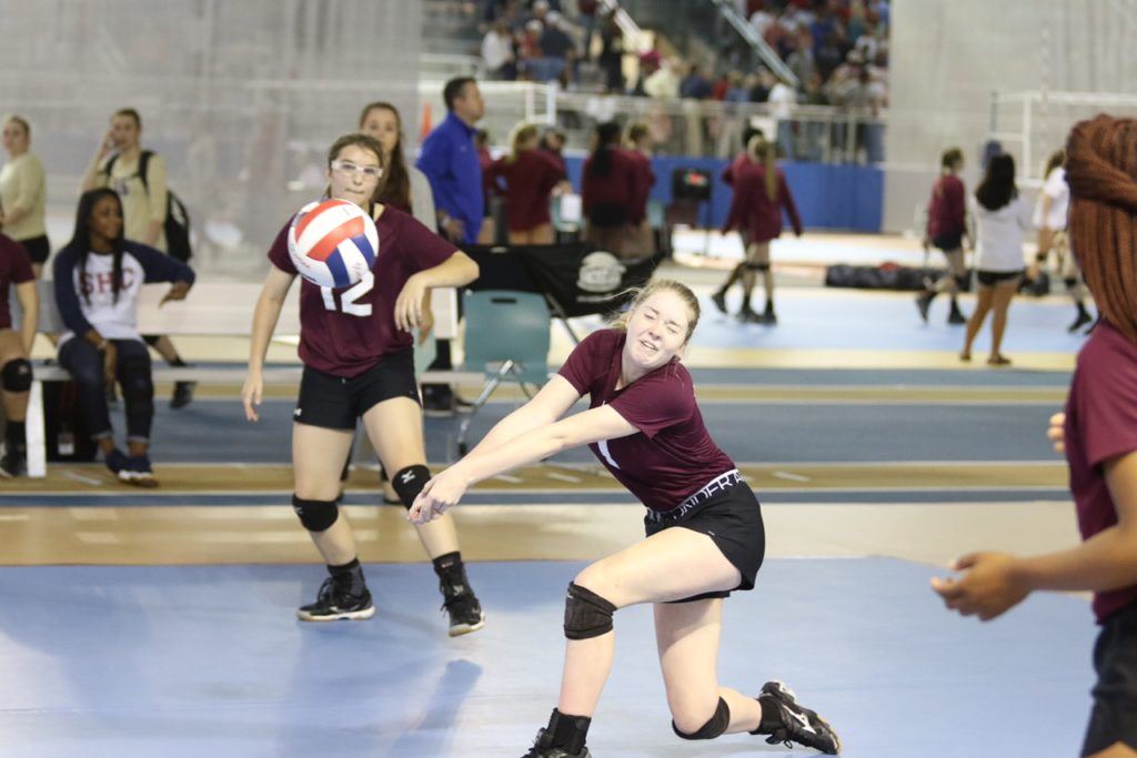 Sacred Heart's Deborah Greene makes a play on the ball during the Lady Cardinals' heart-breaking five-set loss to Isabella.