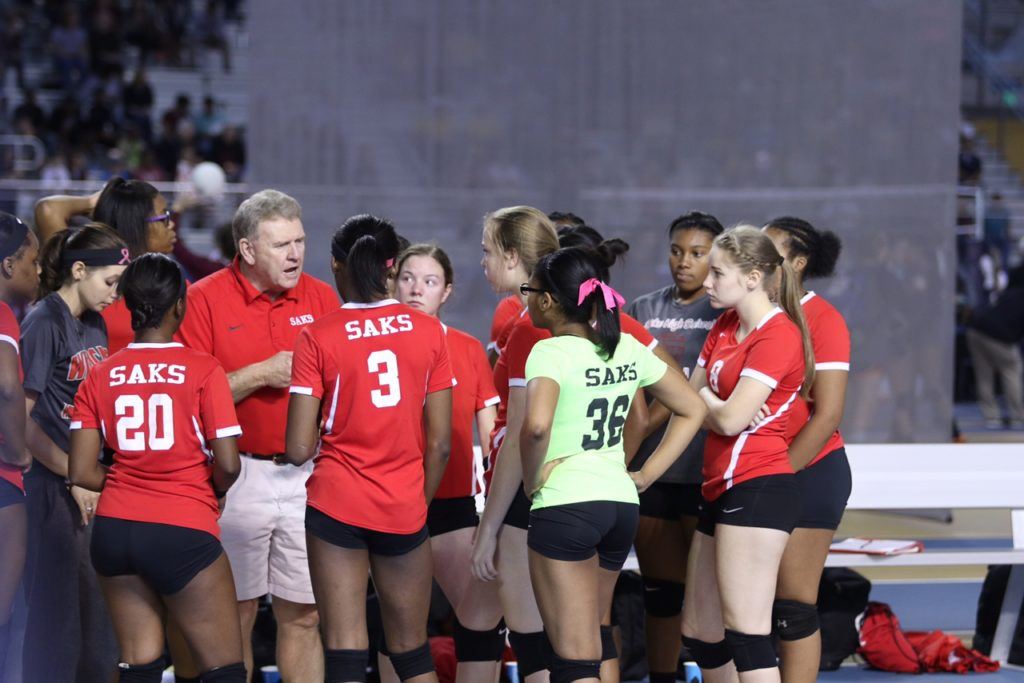 Saks coach Randy Law makes a point to his team during a timeout in its match with Jacksonville.