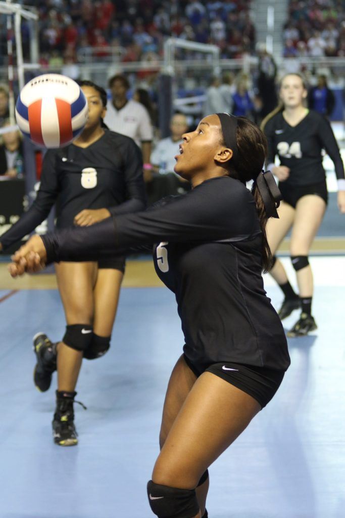 Oxford's Makayla Kidd keeps the ball alive in the Lady Yellow Jackets' quarterfinals match with Spanish Fort.