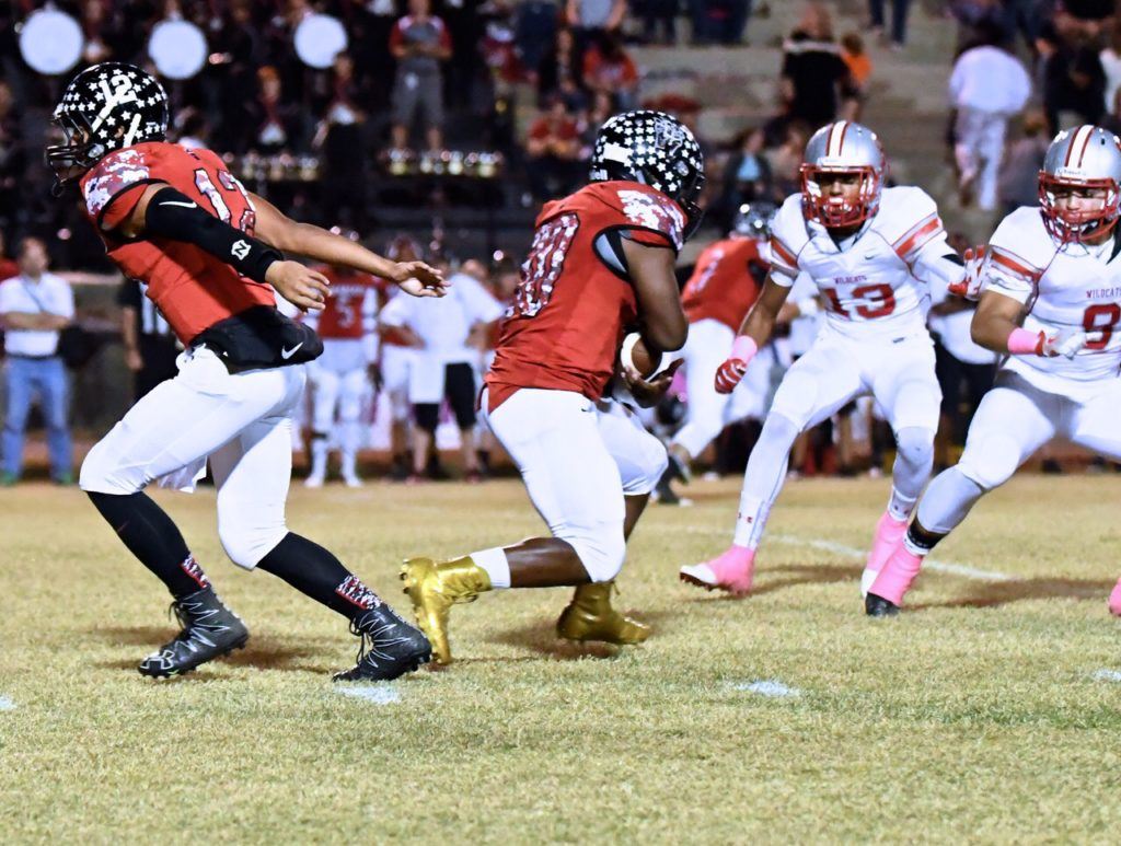 Weaver's Tyrik Hall takes a handoff from Dalton Hamby against Saks. (Photo by B.J. Franklin/GungHo Photos) 