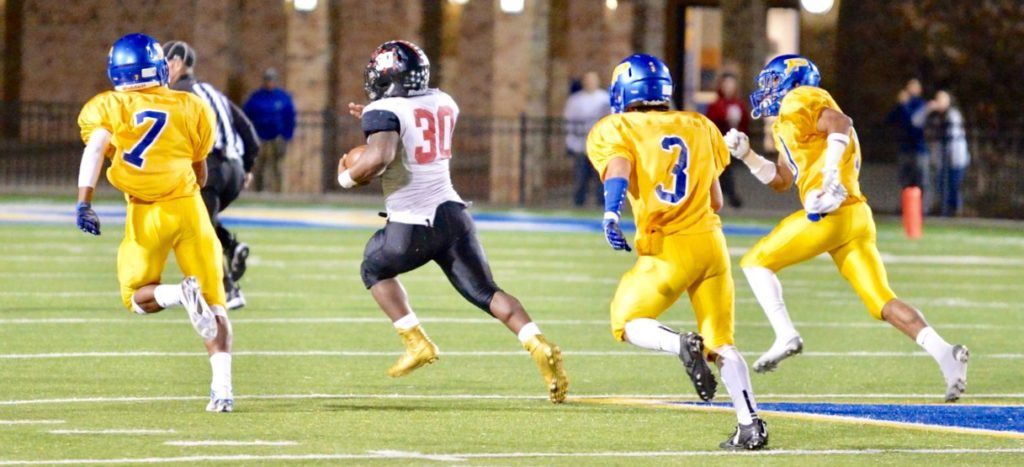 Weaver's Tyrik Hall (1) leads three Piedmont defenders down the field Friday. (Photo by B.J. Franklin/GungHo Photos)